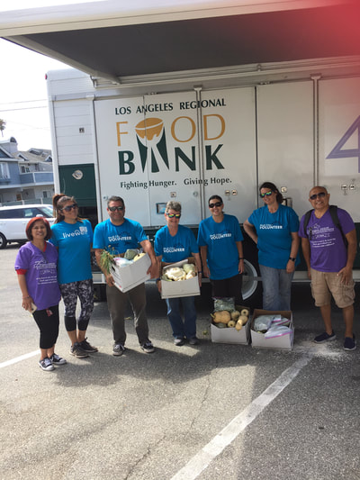 food bank truck with volunteers